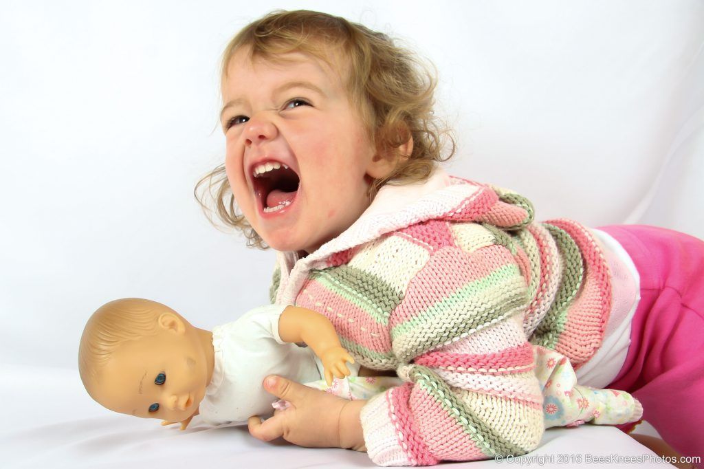 a laughing girl a family photoshoot