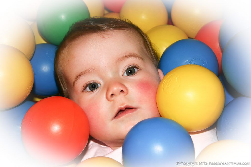 baby in a ball pit