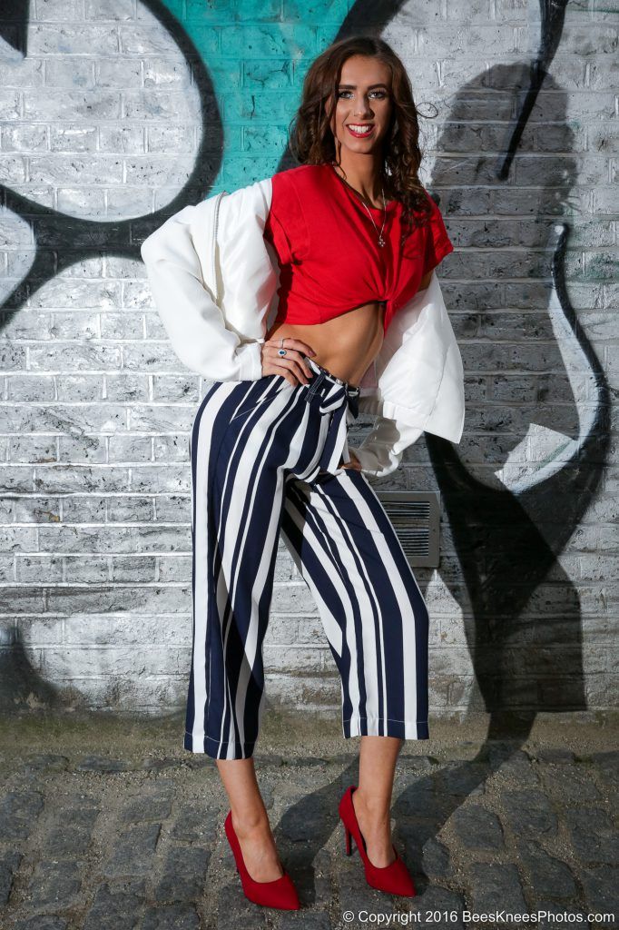 stylish fashion photo in front of graffiti