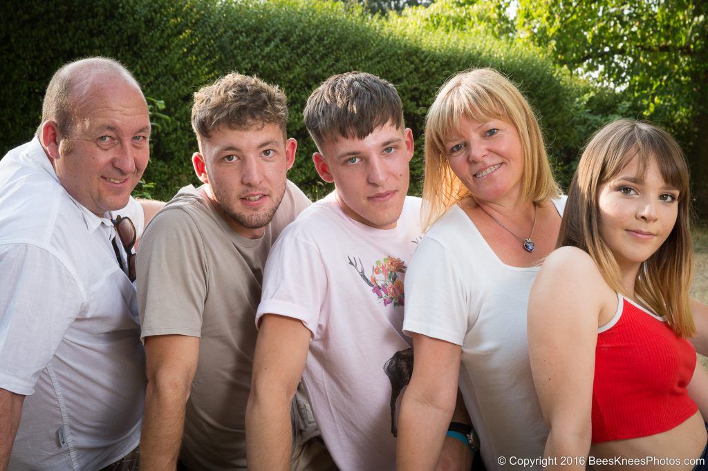 summer photo of a teenage family