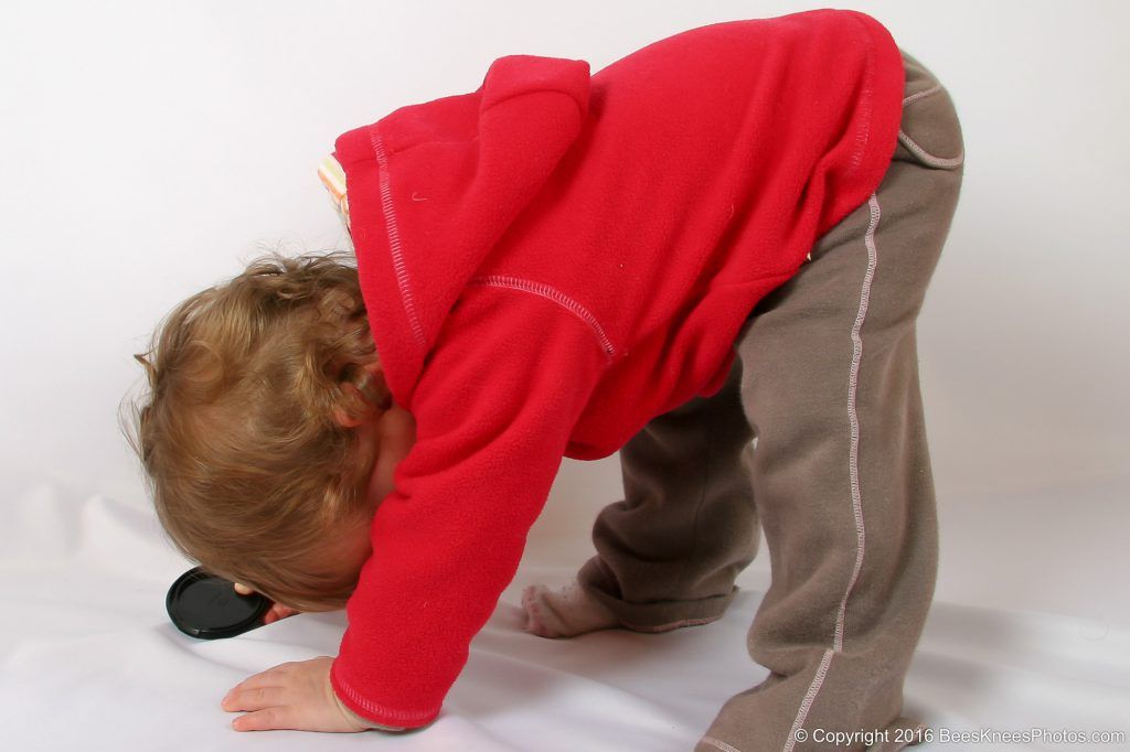 toddler playing in a studio