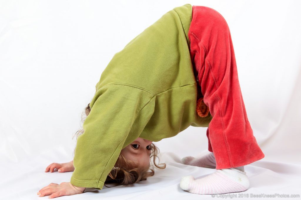 young girl exercising at a family photoshoot